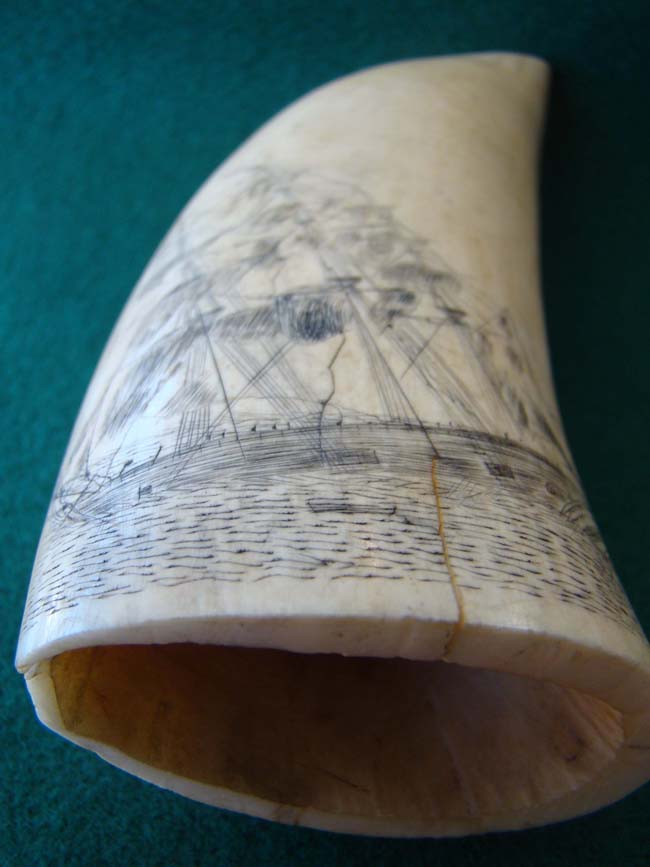 A 19th century scrimshawed whale's tooth featuring a ship listing or floundering — image 4